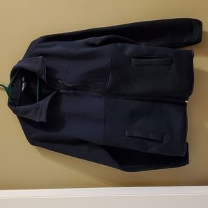 Reebok jacket. Men's size S but its mine(5'7" 130 lb female) So unisex. No wear